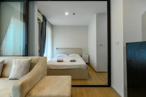 En eller flere senge i et værelse på Zcape 2 Phuket by RESAVA
