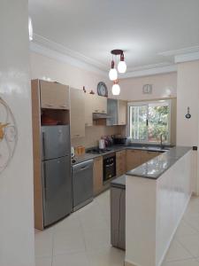 Kuchyň nebo kuchyňský kout v ubytování Apartment In Asilah Marina Golf 2 bedroom