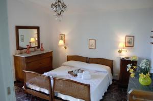Posteľ alebo postele v izbe v ubytovaní Chalet Villa Ornella