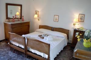 Posteľ alebo postele v izbe v ubytovaní Chalet Villa Ornella