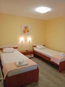 Katil atau katil-katil dalam bilik di Medijana Apartments Niš