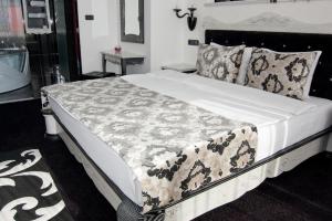 Letto o letti in una camera di Hill Hotel Wellness & Spa