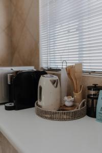 Dip in, Dip out HQにあるコーヒーまたはお茶