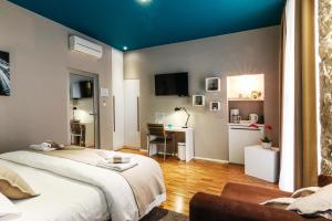 Posteľ alebo postele v izbe v ubytovaní Riva Luxury Rooms + 37 fotografií