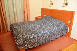 Katil atau katil-katil dalam bilik di Garni Hotel Park