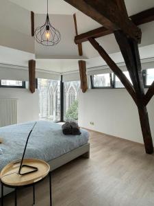 Ένα ή περισσότερα κρεβάτια σε δωμάτιο στο Evelyns Corner Duplex