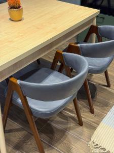 a table with two chairs and a wooden table at Seabreeze in Nardaran +29 photos