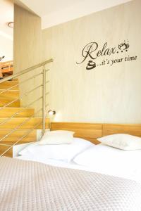 Postel nebo postele na pokoji v ubytování Relax Apartma