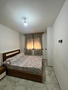 Postel nebo postele na pokoji v ubytování Appartements familiaux confortables à 5 min de la plage Martil شقق عائلية مريحة على بعد 5 دقائق من الشاطئ مرتيل
