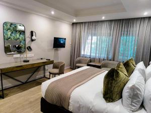 TV a/nebo společenská místnost v ubytování Cresta Thapama Hotel