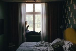 Voodi või voodid majutusasutuse Hotel Flora toas