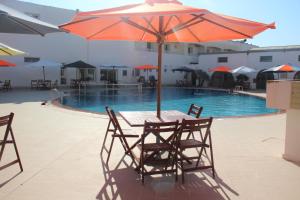 Πισίνα στο ή κοντά στο Hotel Beausoleil kélibia