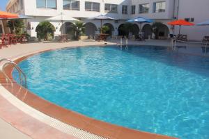 Πισίνα στο ή κοντά στο Hotel Beausoleil kélibia +6 φωτογραφίες