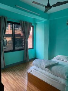 Ένα ή περισσότερα κρεβάτια σε δωμάτιο στο Kaphi Homes