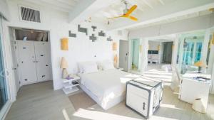 Postel nebo postele na pokoji v ubytování Aluoly 23 Private Resort
