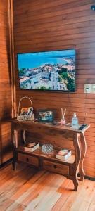 TV a/nebo společenská místnost v ubytování Cabana em Urubici
