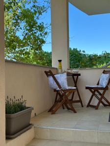 Ein Balkon oder eine Terrasse in der Unterkunft Apartmani Luka & Iva