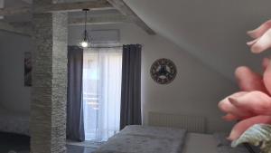 Postel nebo postele na pokoji v ubytování Studio apartman GRIZZLY