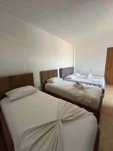 Postel nebo postele na pokoji v ubytování Vila Star