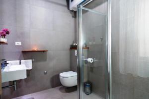 Kúpeľňa v ubytovaní Riva Luxury Rooms