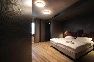 Postel nebo postele na pokoji v ubytování Crimea Wine Hotel