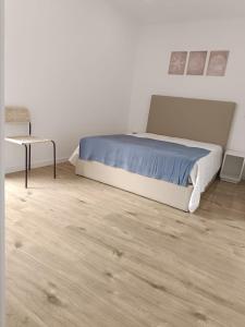 Ένα ή περισσότερα κρεβάτια σε δωμάτιο στο Riad'a Praia