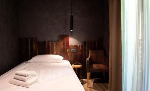Postel nebo postele na pokoji v ubytování Crimea Wine Hotel