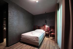 Postel nebo postele na pokoji v ubytování Crimea Wine Hotel