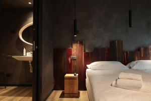 Postel nebo postele na pokoji v ubytování Crimea Wine Hotel