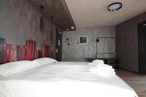 Postel nebo postele na pokoji v ubytování Crimea Wine Hotel