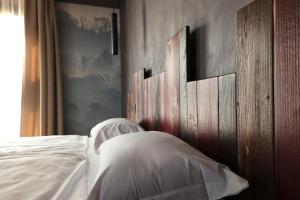 Postel nebo postele na pokoji v ubytování Crimea Wine Hotel