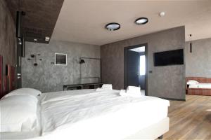 Postel nebo postele na pokoji v ubytování Crimea Wine Hotel