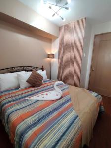 Katil atau katil-katil dalam bilik di Condominium in Davao city