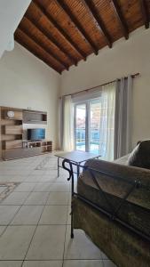 Χώρος καθιστικού στο Bungalow White Apartments