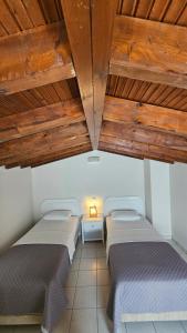 Ένα ή περισσότερα κρεβάτια σε δωμάτιο στο Bungalow White Apartments +23 φωτογραφίες