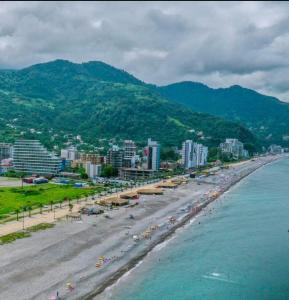 a view of a beach with buildings and the ocean at barbare in Gonio +20 photos