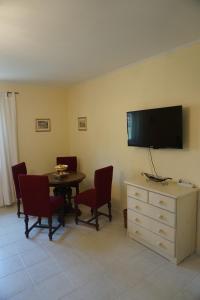 A television and/or entertainment centre at Villa Ida
