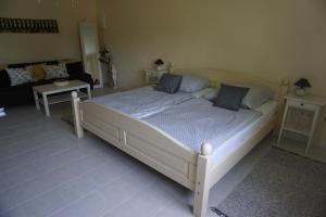 A bed or beds in a room at Villa Ida