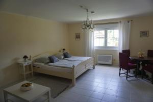 A bed or beds in a room at Villa Ida