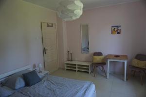 A bed or beds in a room at Villa Ida