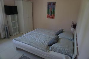 A bed or beds in a room at Villa Ida