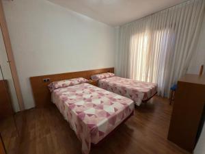 Postel nebo postele na pokoji v ubytování Apartamento pleno centro Benidorm