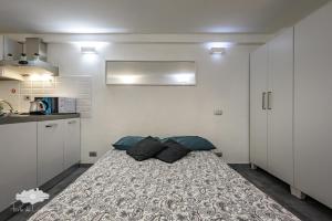 Η κουζίνα ή μικρή κουζίνα στο Nel cuore dei rolli +6 φωτογραφίες