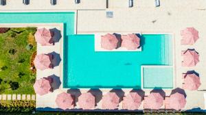 an overhead view of a building with a swimming pool at J'ADORE Secret Garden A&K Deluxe Studio in Sunny Beach