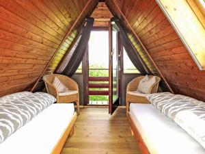 Ένα ή περισσότερα κρεβάτια σε δωμάτιο στο Holiday Home Svea by Interhome