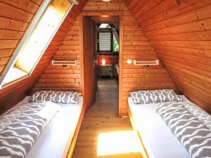 Ένα ή περισσότερα κρεβάτια σε δωμάτιο στο Holiday Home Svea by Interhome
