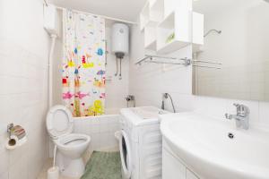 Kúpeľňa v ubytovaní tiho's apartments + 22 fotografií
