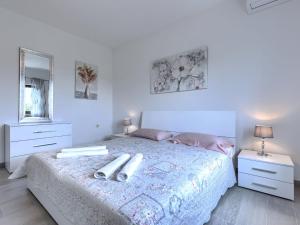 Postel nebo postele na pokoji v ubytování Holiday Home Kristina by Interhome