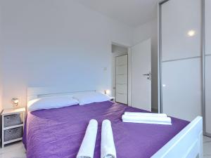 Postel nebo postele na pokoji v ubytování Holiday Home Kristina by Interhome