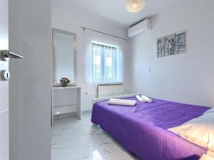 Postel nebo postele na pokoji v ubytování Holiday Home Kristina by Interhome